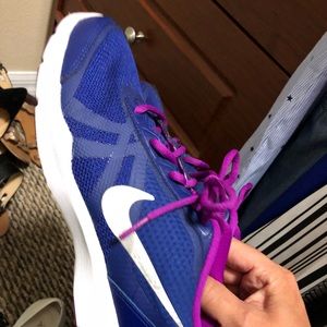 Nike purple and fuchsia running shoes